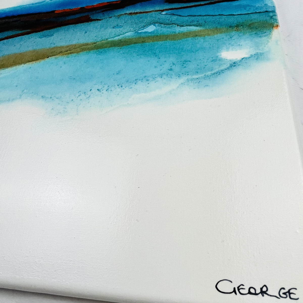 Abstract ink painting with sweeping blue and earth-toned layers evoking a modern coastal seascape