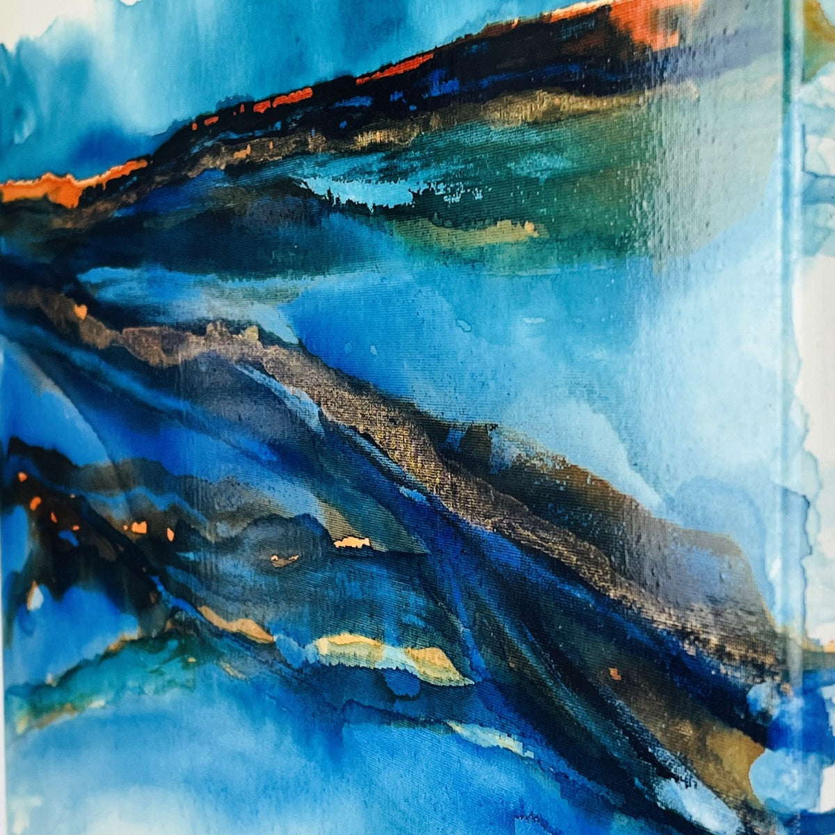 Fluid ocean-inspired artwork with bold turquoise and earth tones in acrylic ink on canvas by Charlotte George Artist